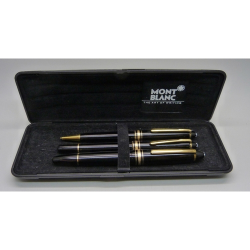 925 - A set of three Mont Blanc Meisterstuck pens/pencil, fountain pen with 14ct gold nib and numbered II1... 