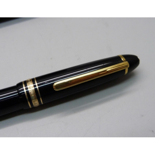 925 - A set of three Mont Blanc Meisterstuck pens/pencil, fountain pen with 14ct gold nib and numbered II1... 