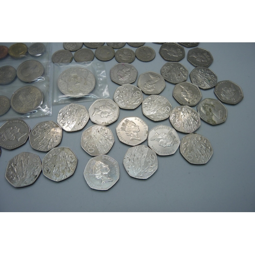 944 - Twenty eight out of date 50p coins, most D-Day landings design and other British coins