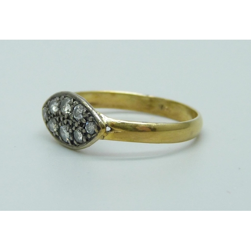 956 - A yellow metal diamond set ring, marked 18K, T