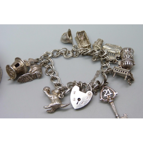 958 - A silver charm bracelet and a bangle, bangle a/f, charm bracelet 41g