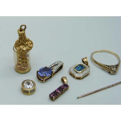 960 - A 9ct gold ring, four 9ct gold pendants, a 9ct gold charm and a yellow metal stick pin marked 15c, 1... 