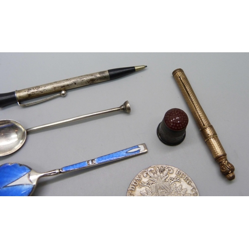 966 - Assorted items including two enamelled silver spoons, a Maria Theresa 1780 silver coin, white metal ... 