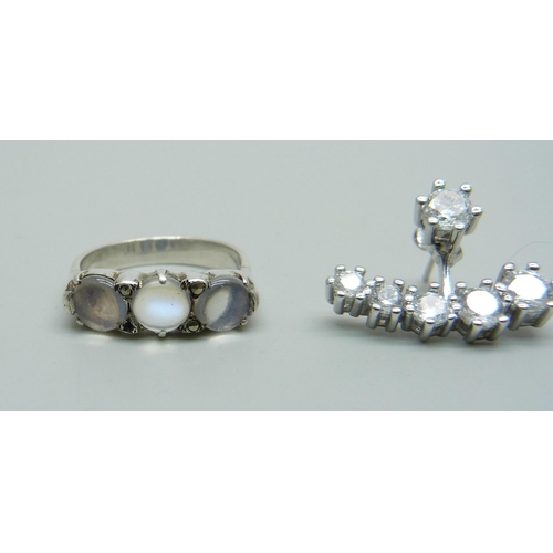 995 - A silver and moonstone ring and a pair of silver and clear stone earrings