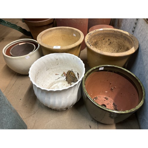 299 - Assorted plant pots including terracotta