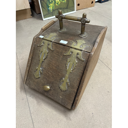 303 - A Victorian oak and brass mounted coal scuttle