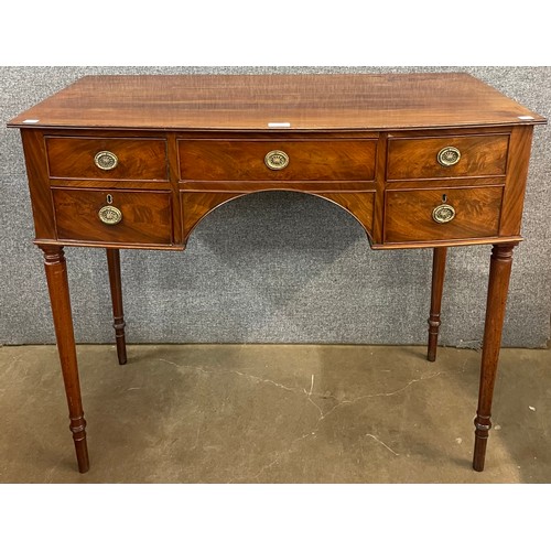 136 - A George IV mahogany bow front side table