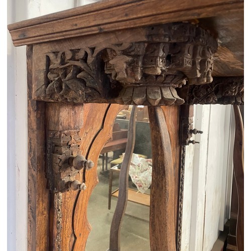 147 - A far eastern carved wood mirrorback side cabinet