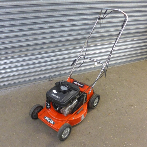 A Rover Turbo Thrust self propelled petrol driven lawnmower with a Briggs and Stratton 55 1 C petrol