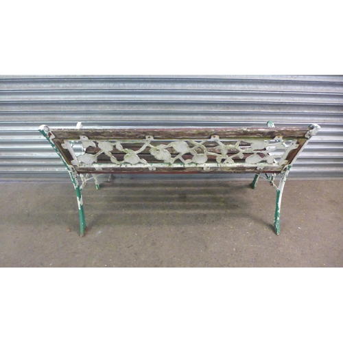 2201 - A 125cm  wooden garden bench with cast iron bench ends