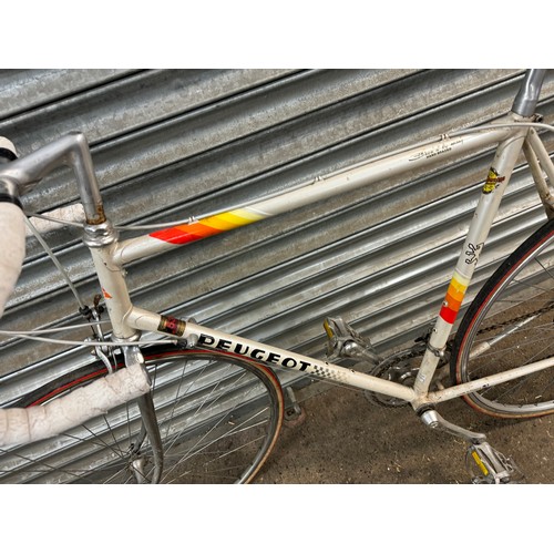 2185 - A Peugeot 531 hand brazed mens road bike and a Peugeot HLE - Premierelle lady's road bike