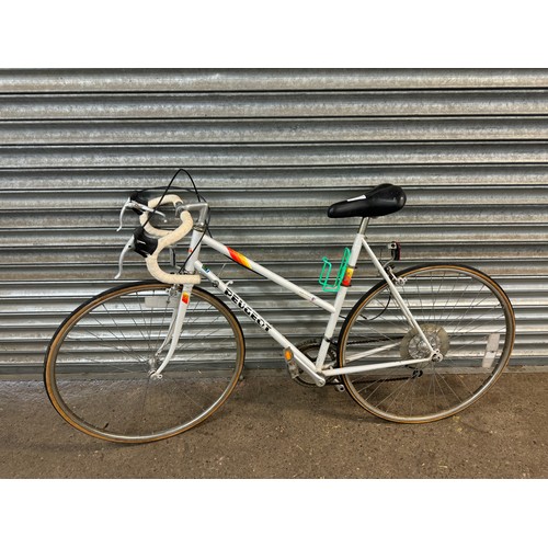 2185 - A Peugeot 531 hand brazed mens road bike and a Peugeot HLE - Premierelle lady's road bike