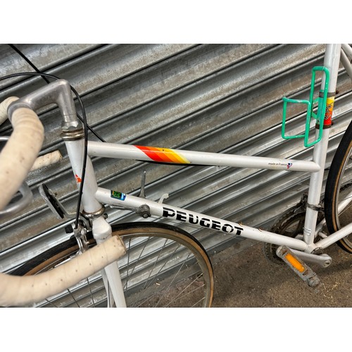 2185 - A Peugeot 531 hand brazed mens road bike and a Peugeot HLE - Premierelle lady's road bike