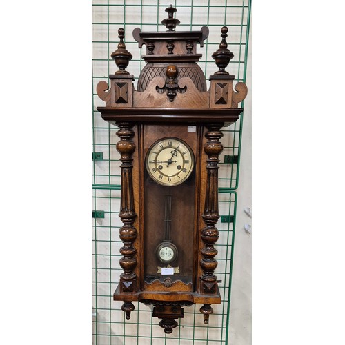 365 - A 19th Century walnut Vienna wall clock