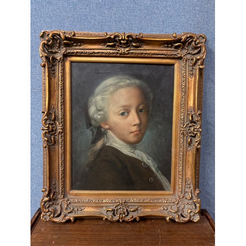 318 - An 18th Century style portrait of a boy, oil on canvas, framed