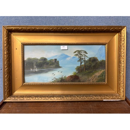 320 - A mountainous lake scene, oil on board, framed