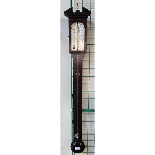 373 - A George III style J. Blatt, Brighton mahogany stick barometer and a warming pan