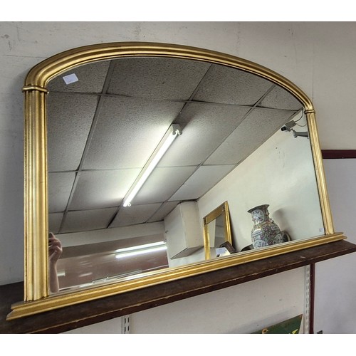 372 - A Victorian style gilt framed overmantel mirror