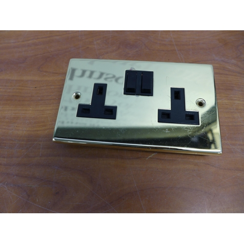 2352 - A box of 22 brass door handles, brass sockets and switches