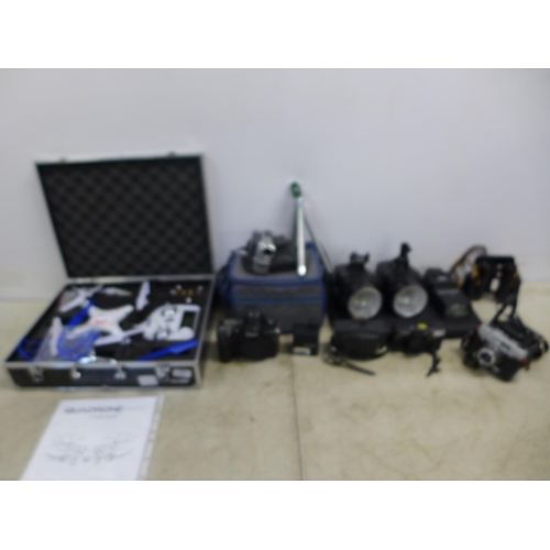 2357 - A mixed lot of camera equipment including green screen, a Nikon D200 camera, a Konica EFP2 camera, a... 