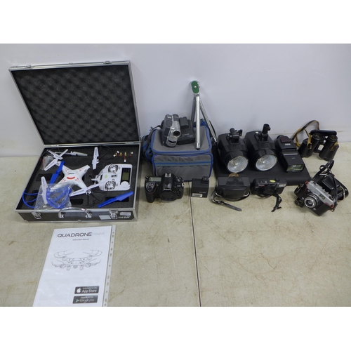 2357 - A mixed lot of camera equipment including green screen, a Nikon D200 camera, a Konica EFP2 camera, a... 