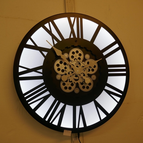 1326 - An illuminated moving gears wall clock