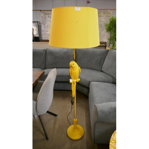 1342 - A yellow floor standing lamp in the form of a parrot