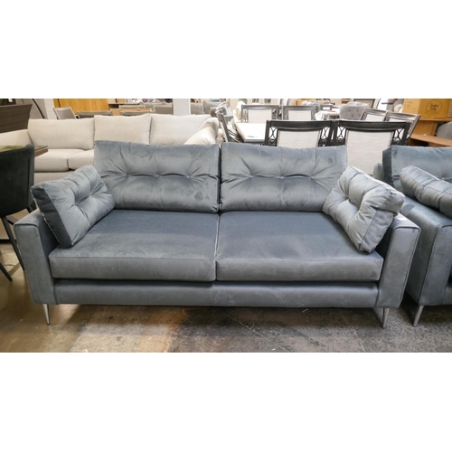 1303 - A slate velvet upholstered three seater sofa and two seater sofa on stiletto legs