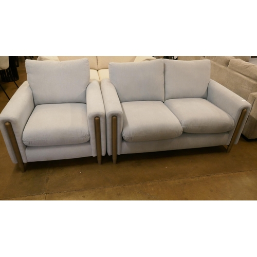 1309 - A sky blue upholstered two seater sofa and armchair on a semi exposed frame RRP £2314