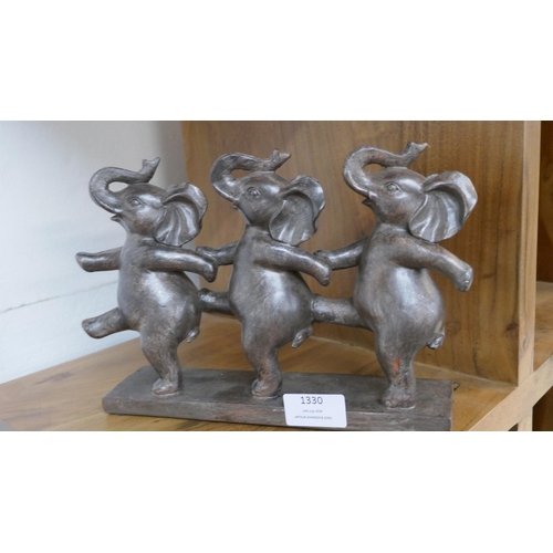 1330 - A trio of dancing elephants (2949213)   *This lot is subject to vat