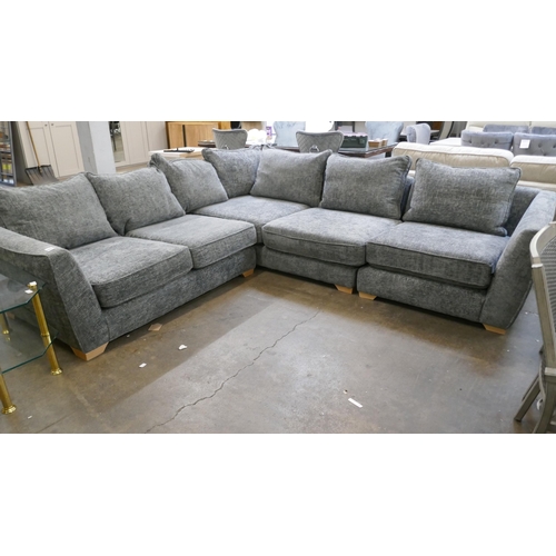 1421 - A storm grey textured weave upholstered corner sofa on oak feet