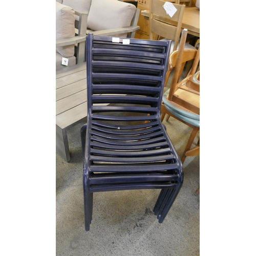 1506 - A set of four navy blue painted, stacking, metal garden chairs