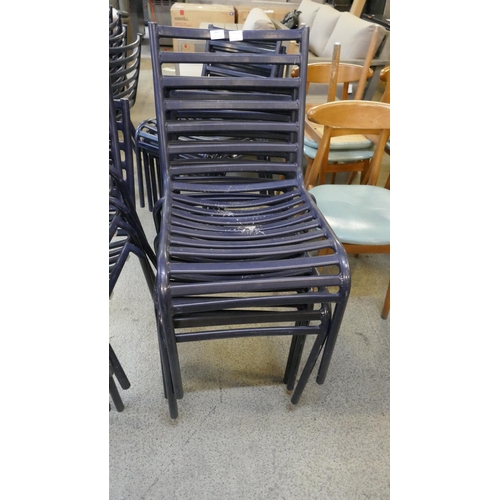 1507 - A set of four navy blue painted, stacking, metal garden chairs