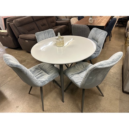 1359 - A Logan circular dining table and four Aran grey velvet chairs