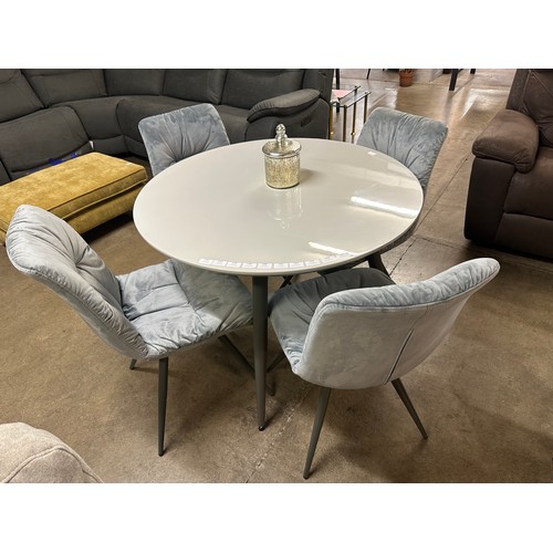 1359 - A Logan circular dining table and four Aran grey velvet chairs