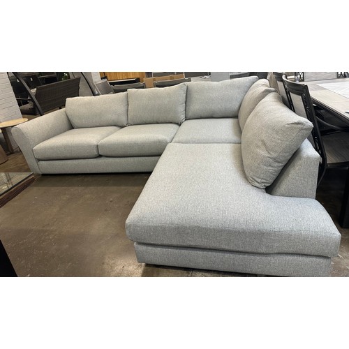 1400 - A grey textured weave upholstered corner sofa