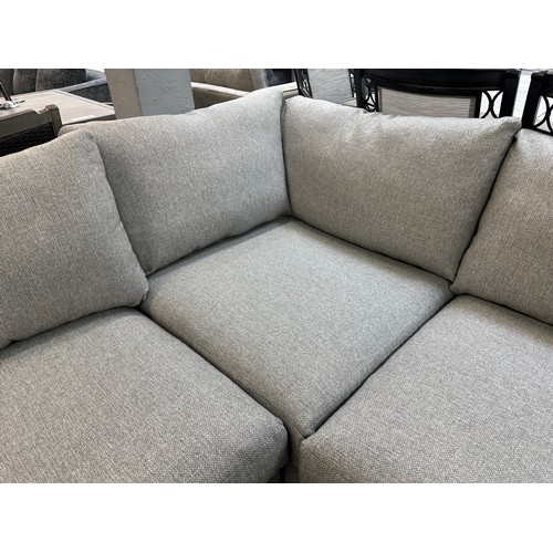 1400 - A grey textured weave upholstered corner sofa