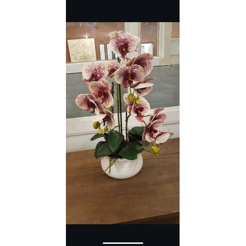 1317A - A triple artificial Orchid arrangement, H 50cms (52263817)   *This lot is subject to vat