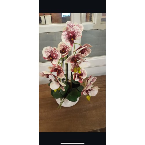 1317A - A triple artificial Orchid arrangement, H 50cms (52263817)   *This lot is subject to vat