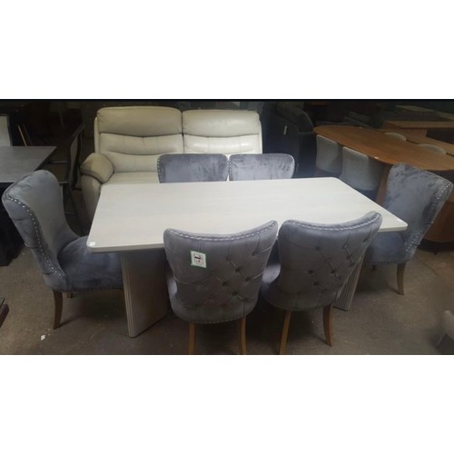 1411 - Light grey wooden dining table and six grey upholstered chairs *This lot is subject to VAT