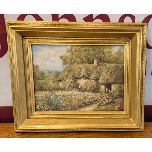 30 - L. Gallon, English cottage garden landscape, oil on board, signed lower right, 29 x 39cms, framed