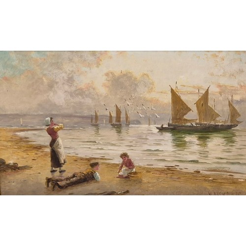 31 - W. Richards, beach scene with children looking out to boats, oil on canvas, signed lower right, 29 x... 