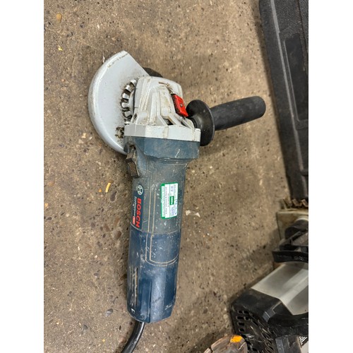 2012 - A Black and Decker KD355CRE 600w drill, a Titan TTB355CHN electric chainsaw and two 110w angle grind... 