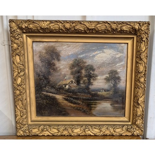 42 - W. King (19th Century), river landscape with a cottage, oil on board, 39 x 50cms, framed