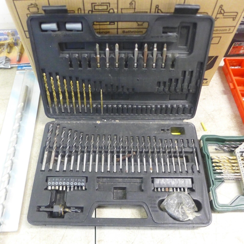 2043 - A large quantity of drill bits, including cased drill bit sets, masonry drill bits and a tool box fu... 