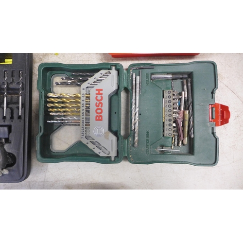 2043 - A large quantity of drill bits, including cased drill bit sets, masonry drill bits and a tool box fu... 