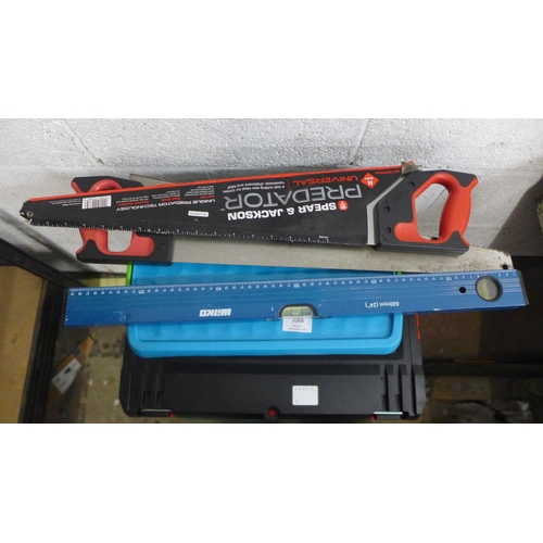 2068 - A Milwaukee 3 section stackable tool box including screwdrivers, pliers, wall fixings, screws, tape ... 