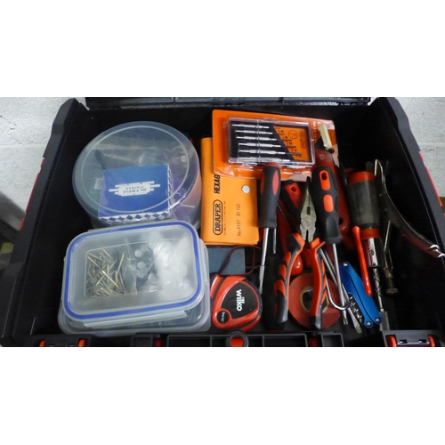 2068 - A Milwaukee 3 section stackable tool box including screwdrivers, pliers, wall fixings, screws, tape ... 