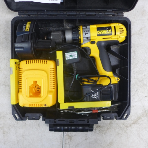 2015 - A Dewalt DC984 14.4v cordless power drill with two batteries, drill bit set, battery charger, instru... 