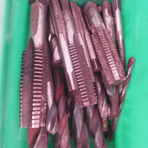 2027 - A green box of taper shank drills, drill bits and engineers taps